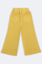 Yellow flared palazzo pants with elastic waistband and slant pintucks on both sides