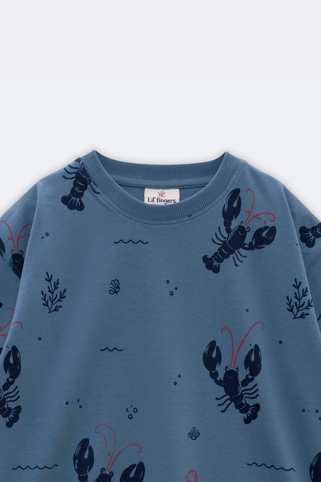 Light blue crew-neck tee with all-over lobster, seaweed, and red accent print