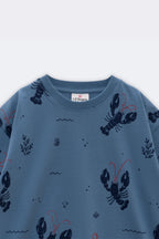 Light blue crew-neck tee with all-over lobster, seaweed, and red accent print