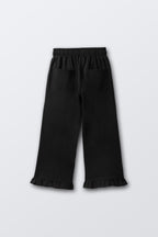 Black flared palazzo pants with elastic waistband and wide straight legs