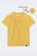 Yellow kids' tee with beaded bow embroidery on the front, crew neck