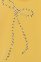 Yellow short-sleeve tee with beaded bow embroidery in dark dots