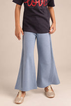 Light blue wide-leg palazzo pants with vertical slant pintuck accents on the sides