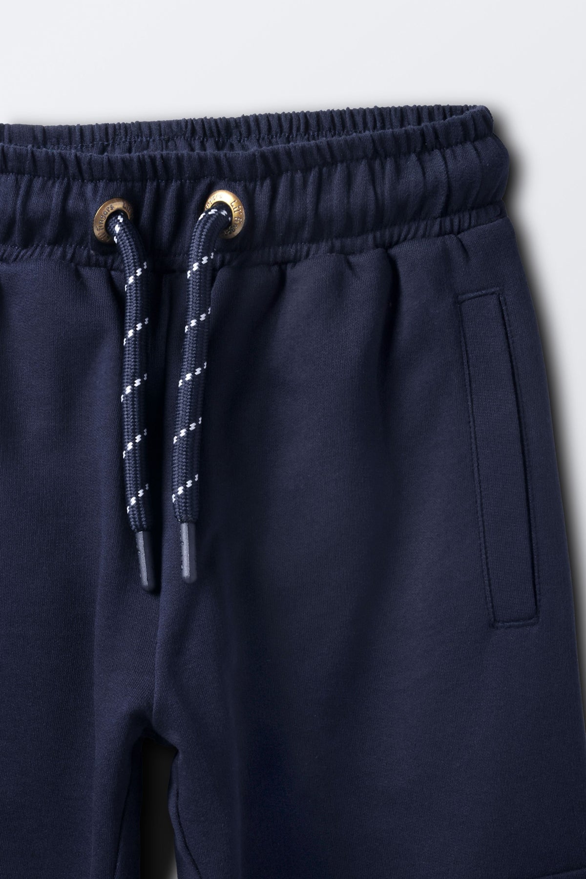 Navy comfort joggers close-up of drawstring and side cargo pocket