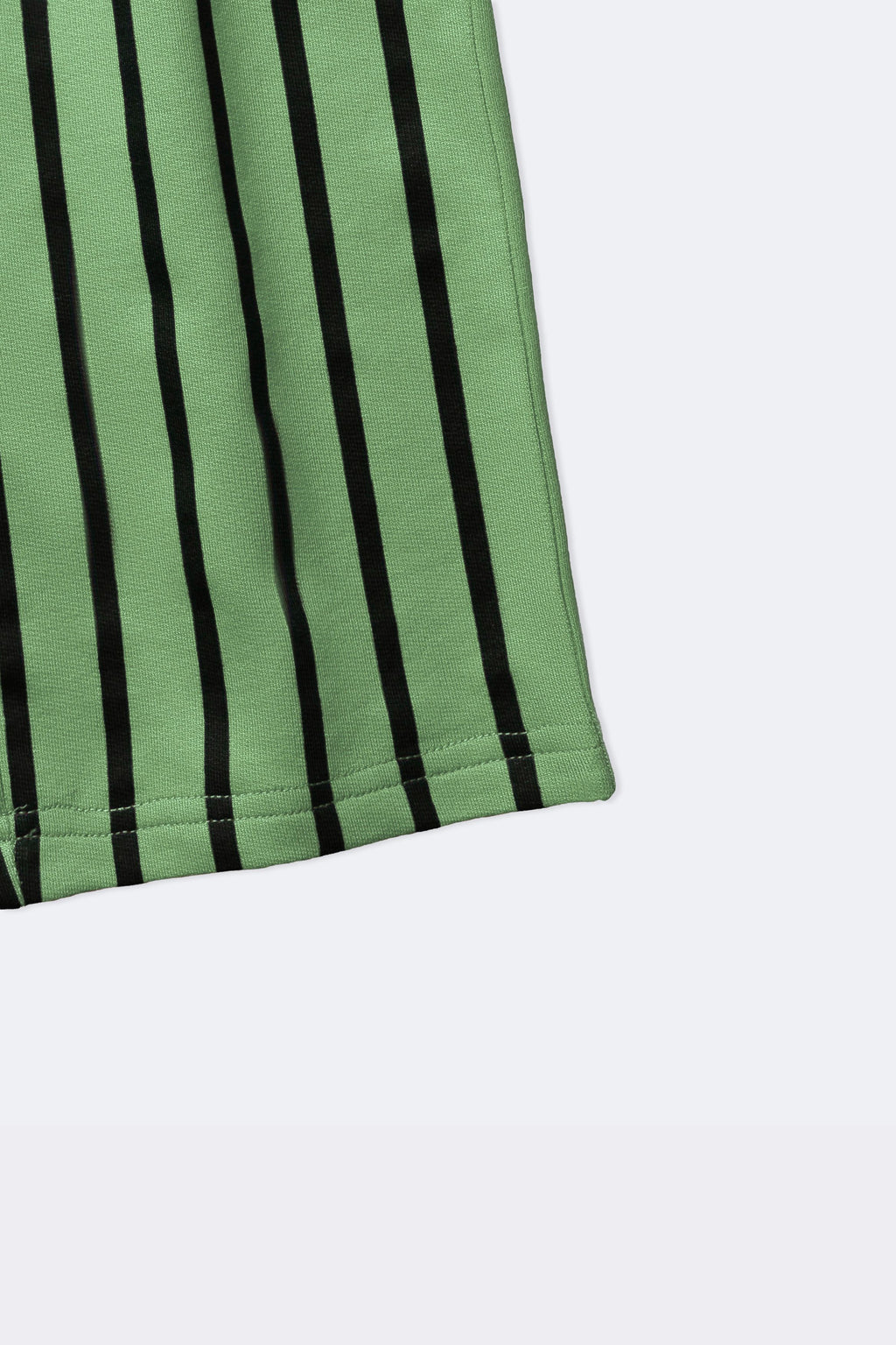 Green striped track pants hem with elastic ankle cuff